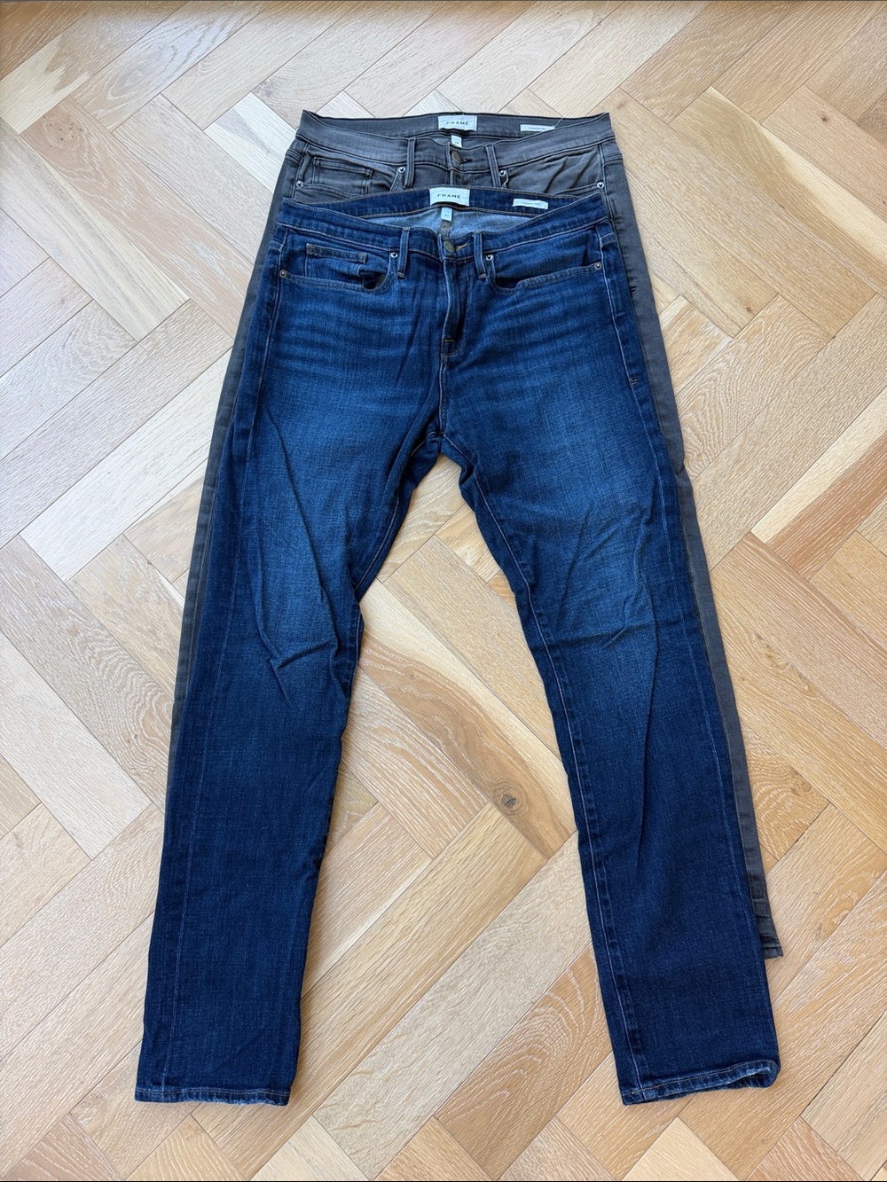 Frame Denim Men’s Skinny Jeans in Dark Blue (with Gray Pair Behind)